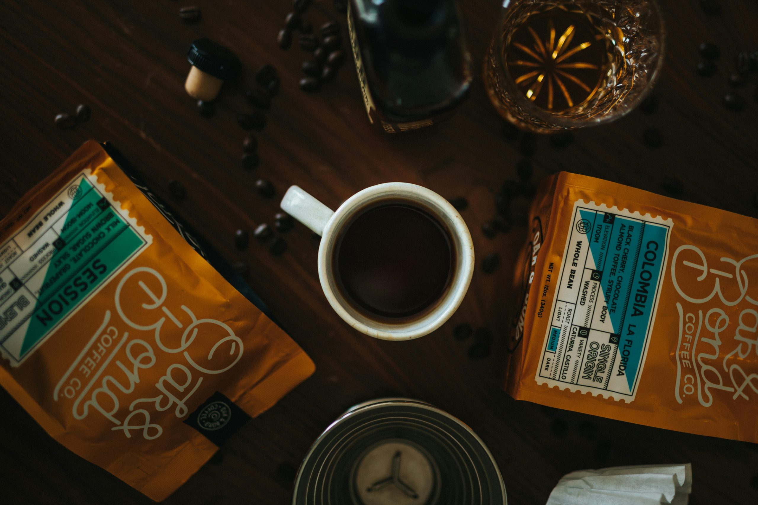 Illustration of a cup of coffee next to a notebook with finance notes