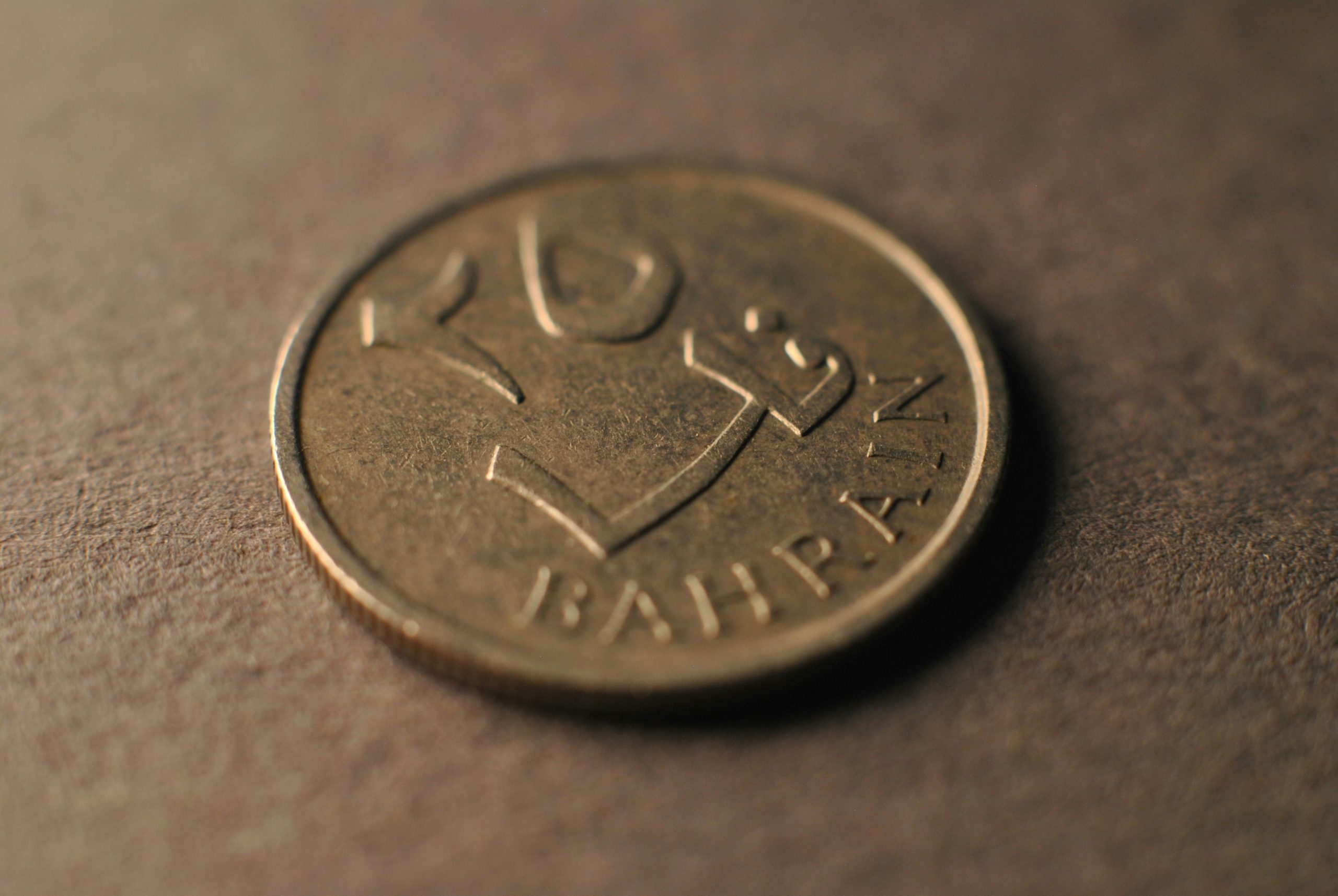 A close up of a coin on a table